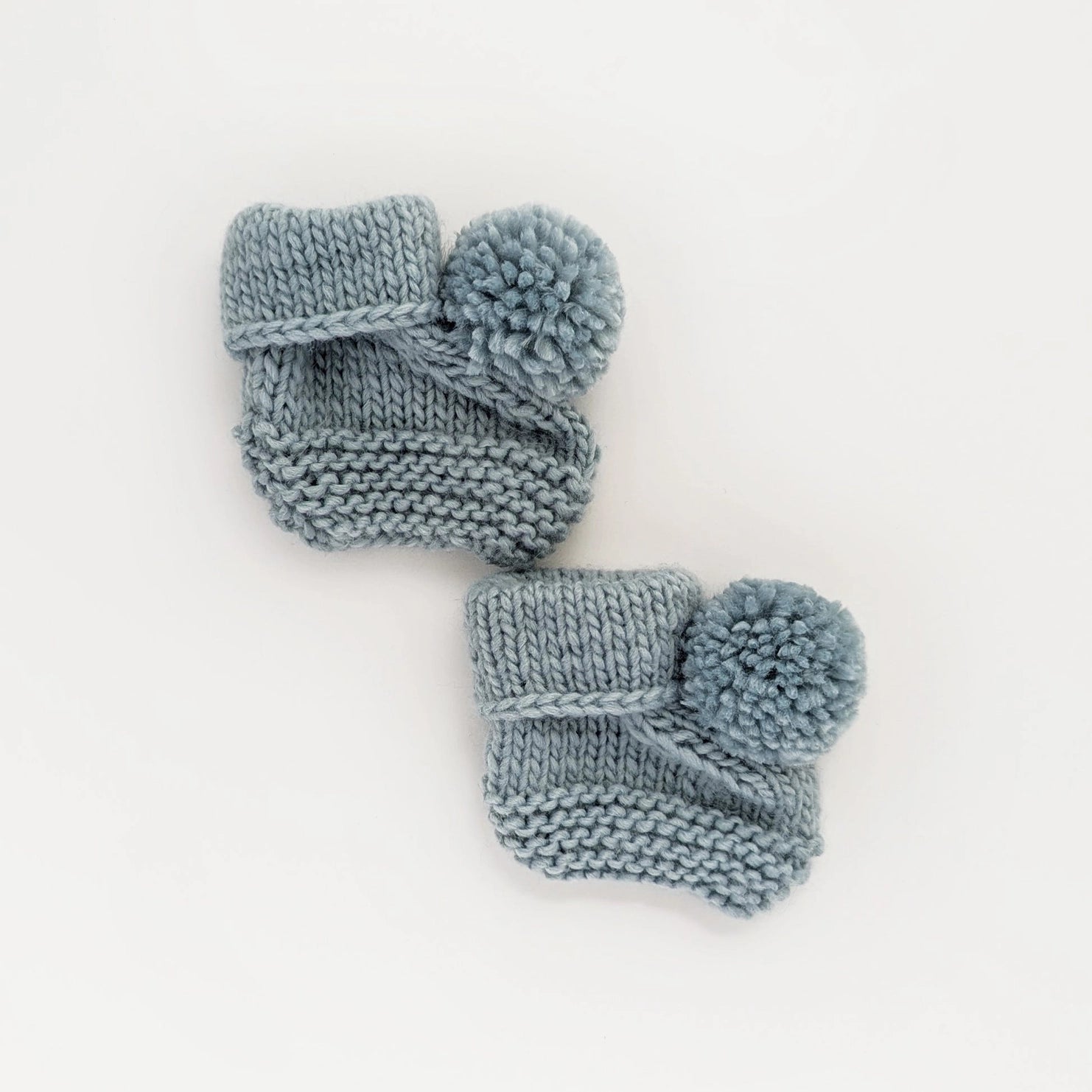 BABY BOOTIES WITH POM POMS