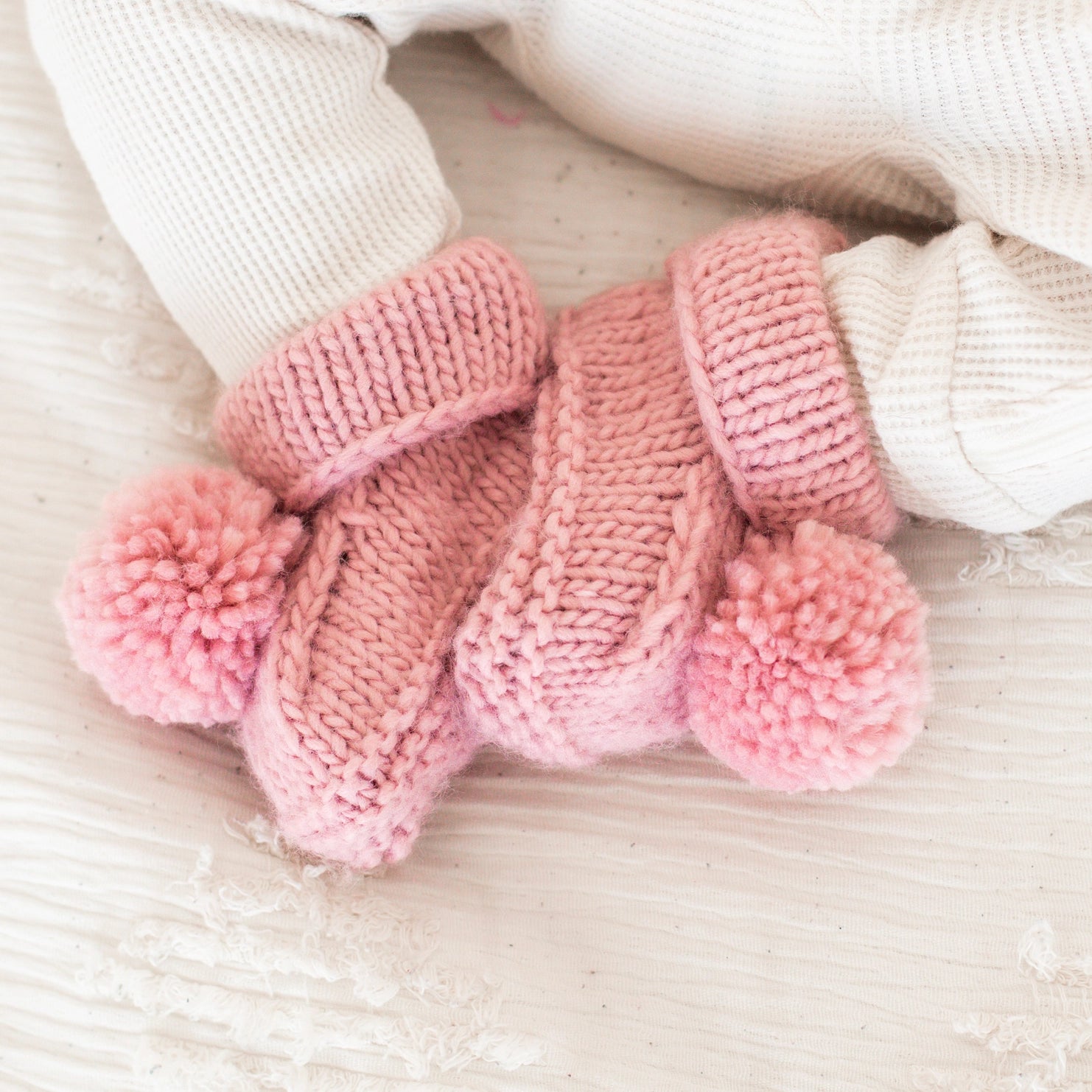 BABY BOOTIES WITH POM POMS