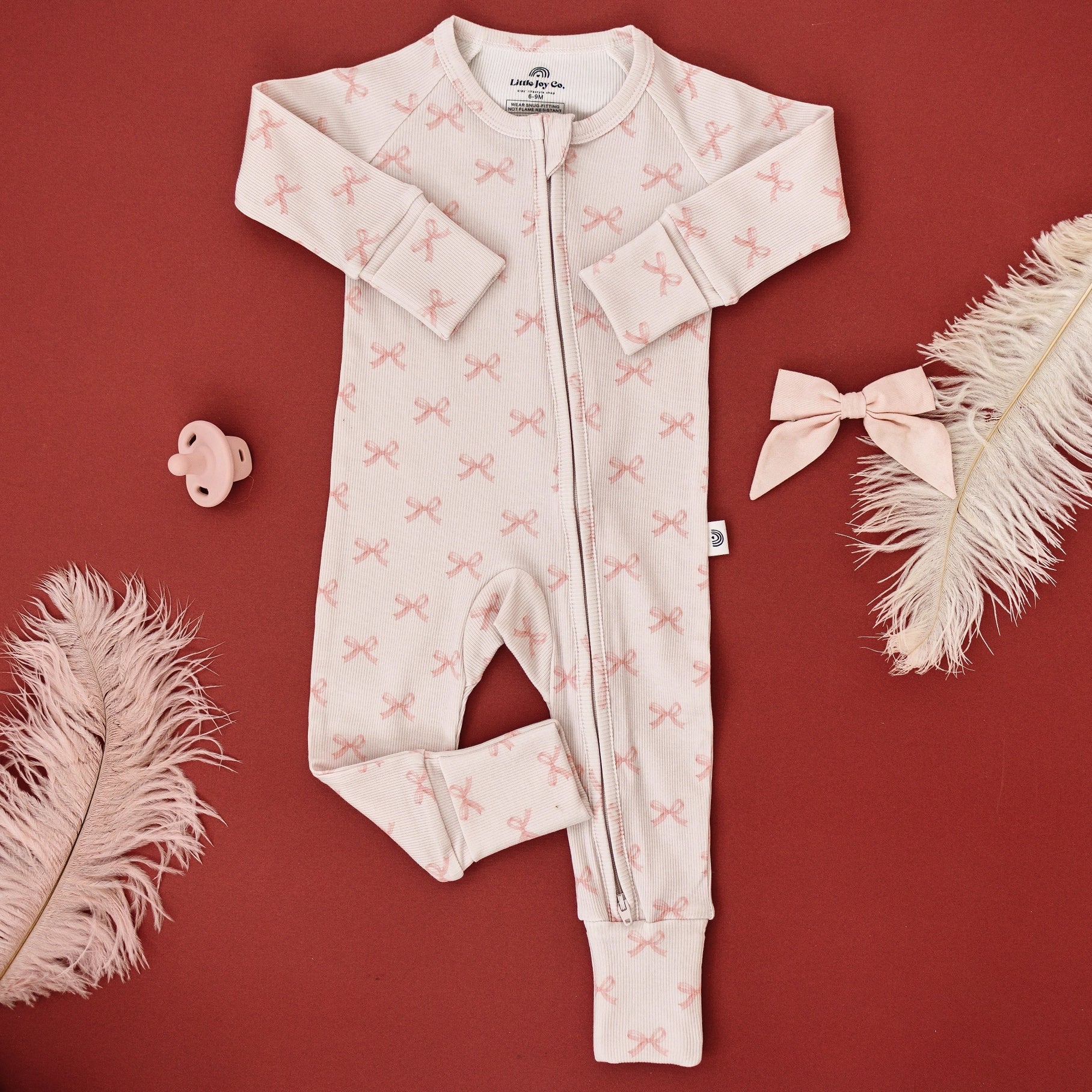 BLUSHING BOWS RIBBED ONESIE - BAMBOO