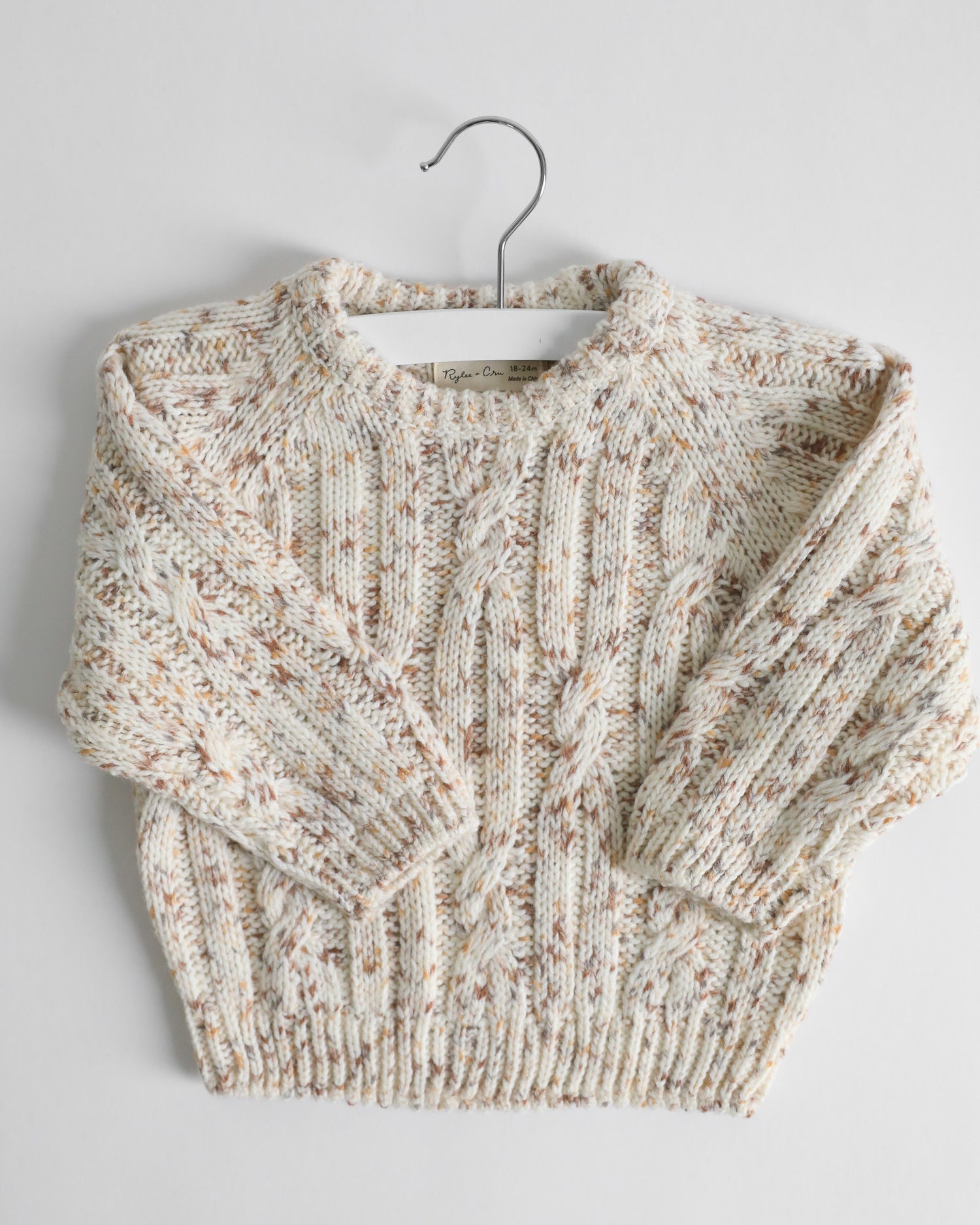 SPECKLED CABLE-KNIT SWEATER