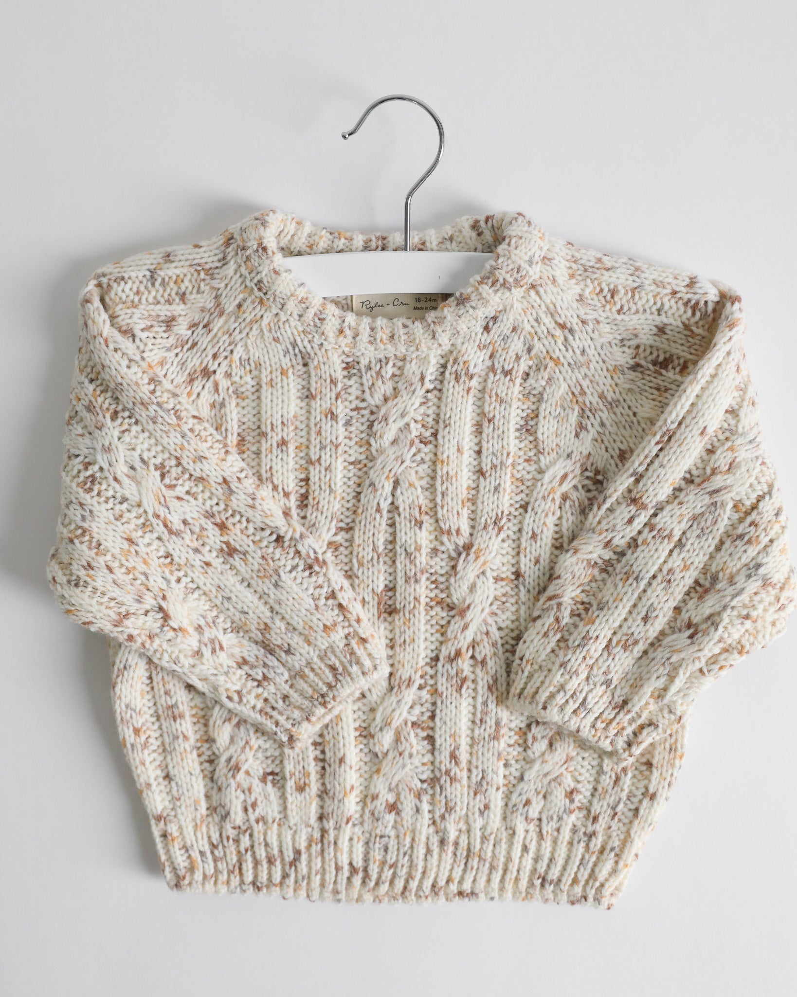 SPECKLED CABLE-KNIT SWEATER