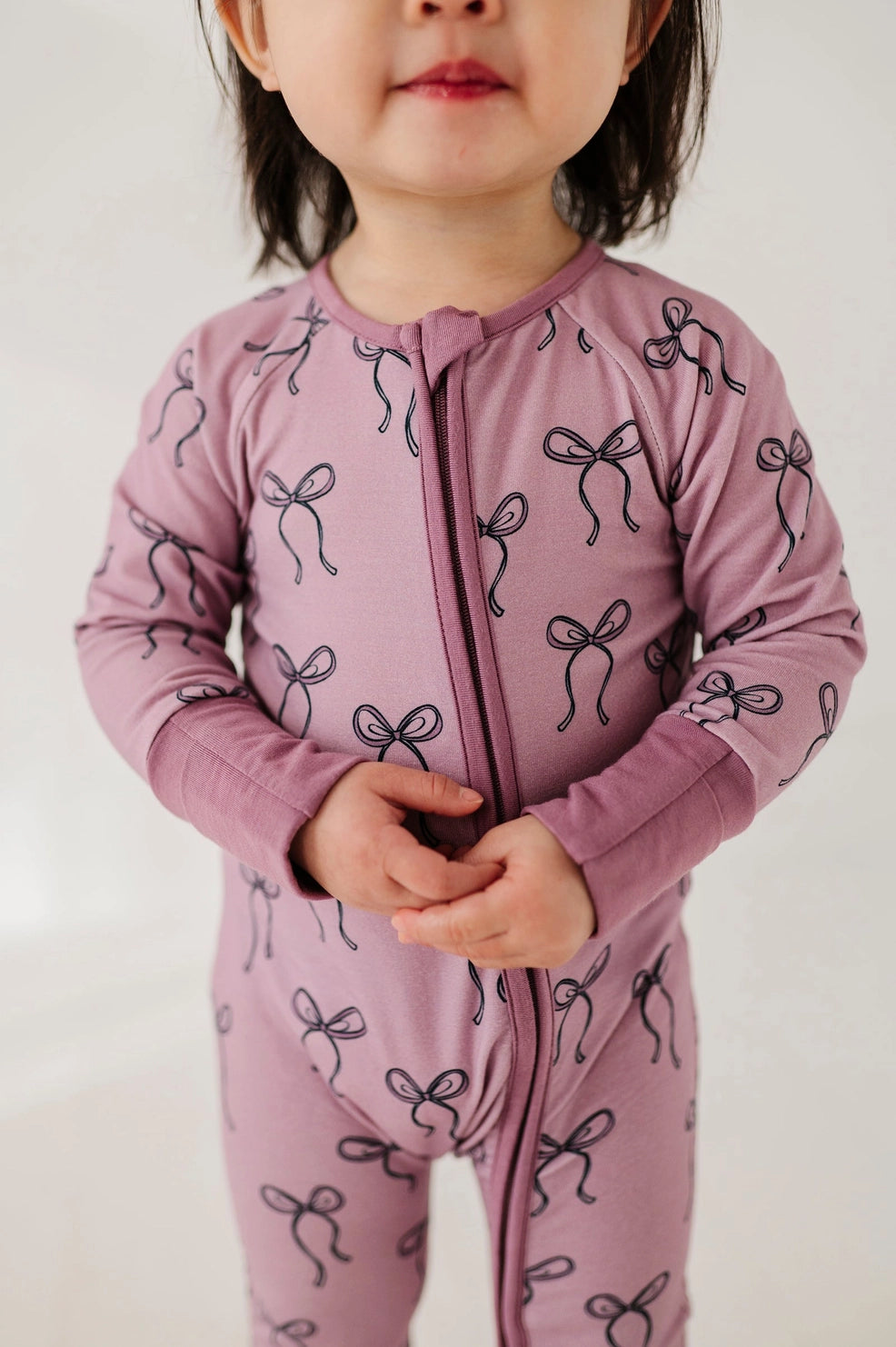 BOW LONG SLEEVE ROMPER