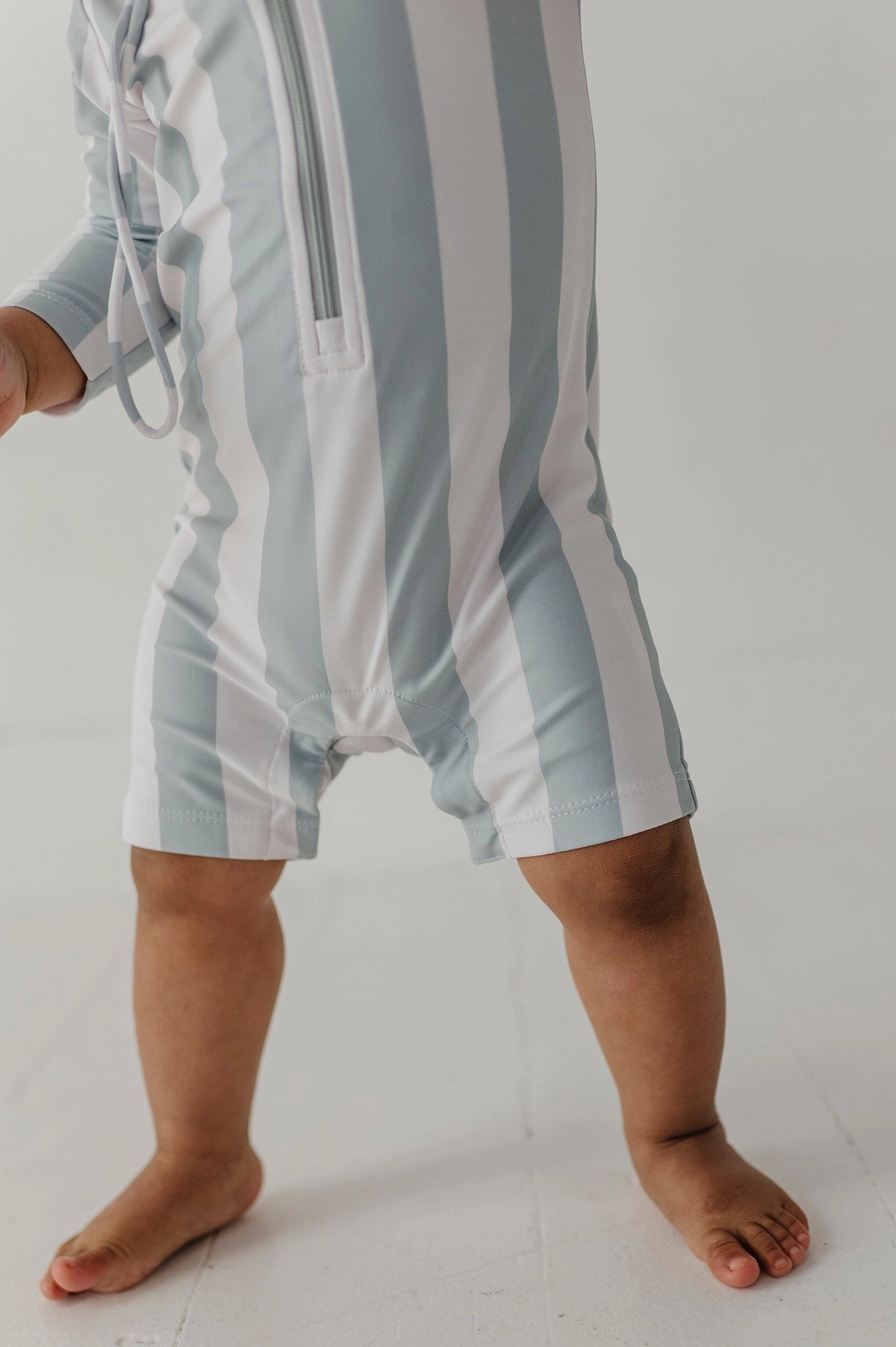STRIPED ONE-PIECE RASH GUARD SWIMSUIT