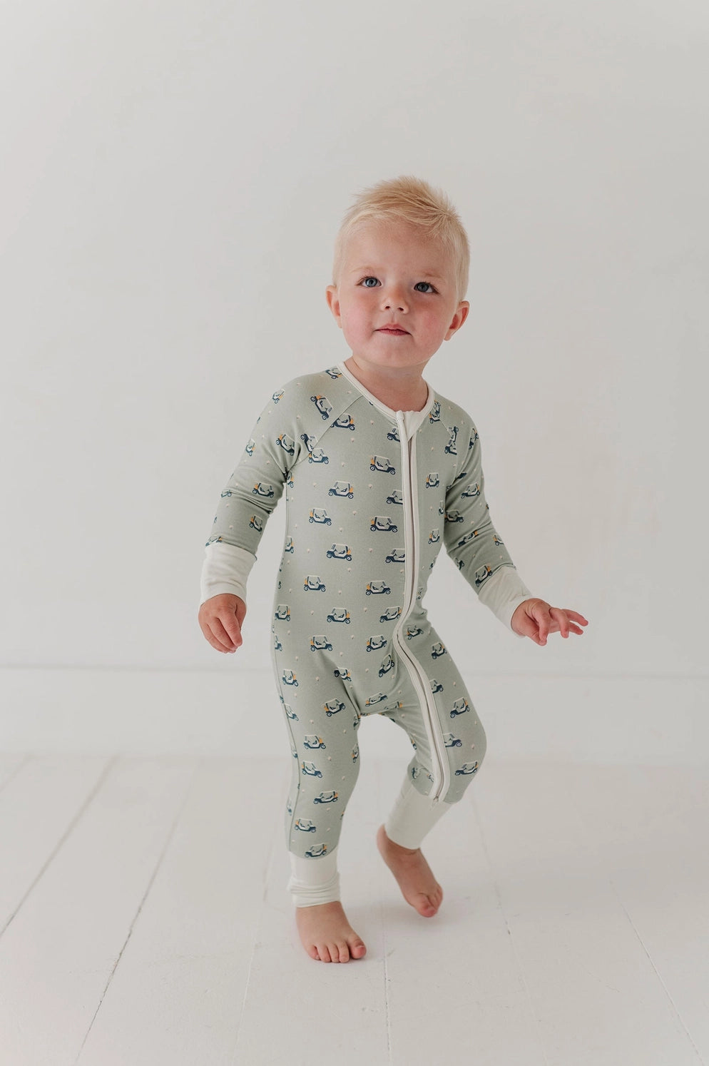 GOLF CART LONG SLEEVE ZIP ROMPER