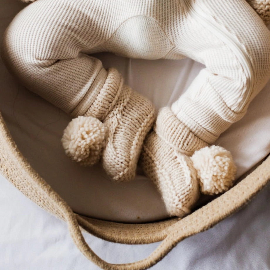 BABY BOOTIES WITH POM POMS