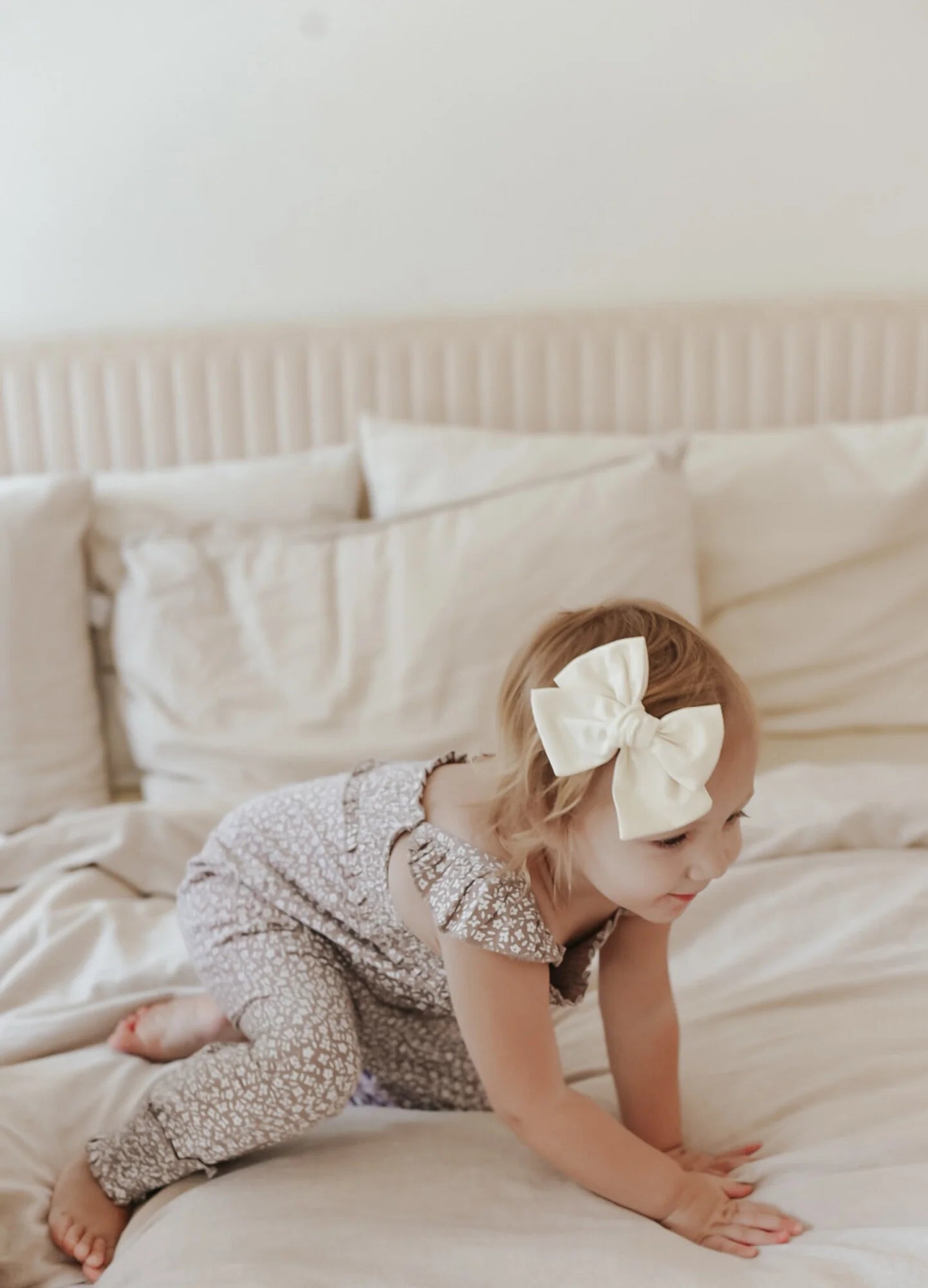 ALMOND FLORAL MUSLIN SLEEVELESS ROMPER