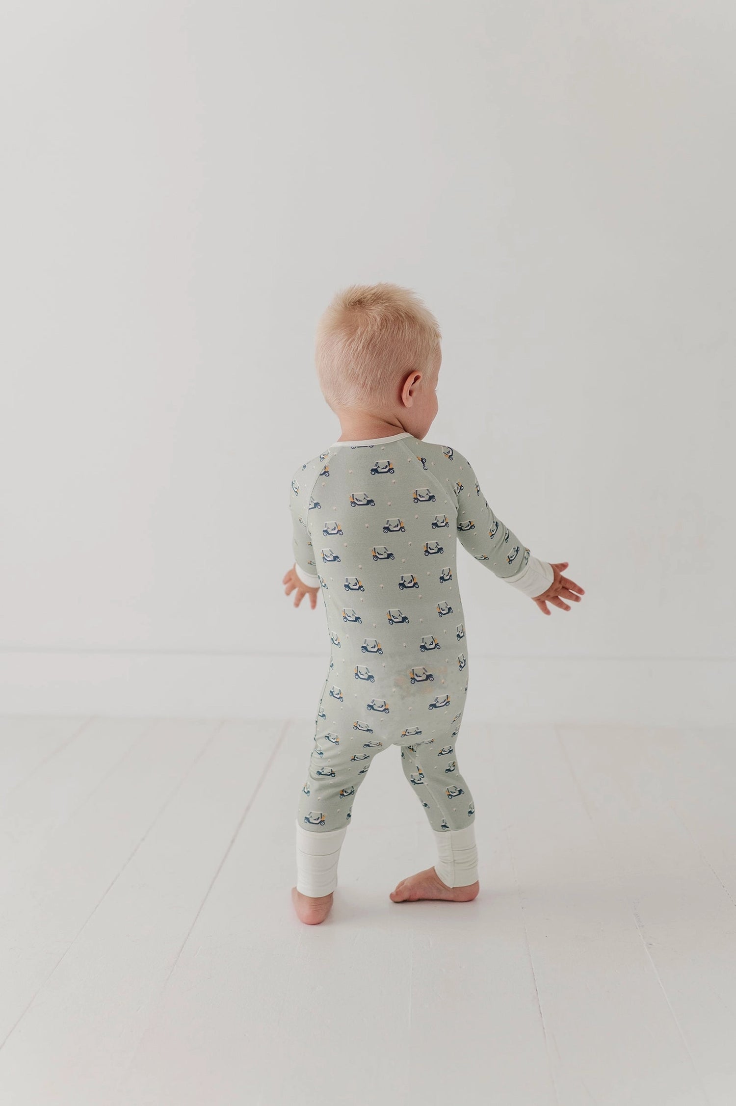 GOLF CART LONG SLEEVE ZIP ROMPER