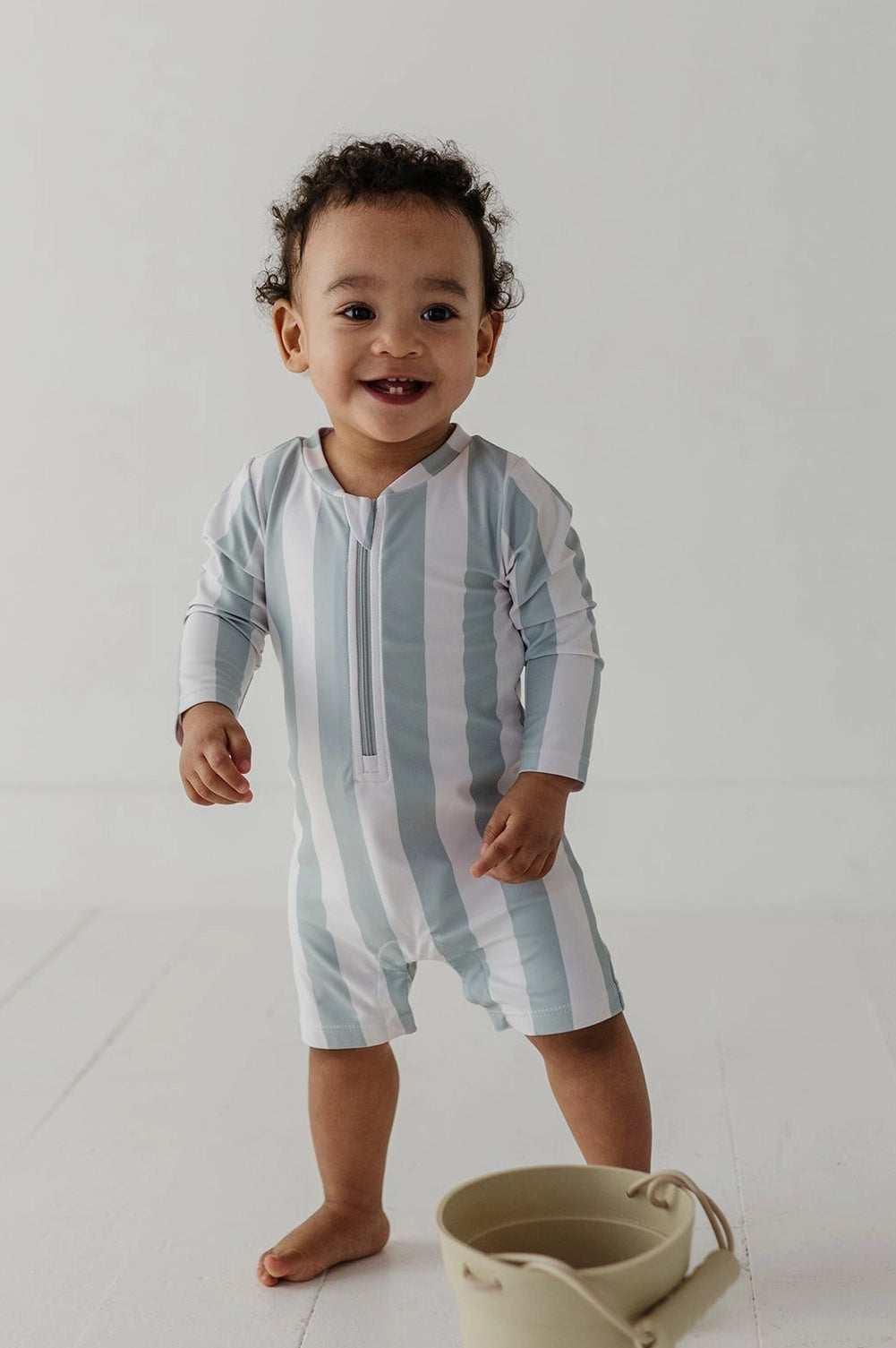 STRIPED ONE-PIECE RASH GUARD SWIMSUIT