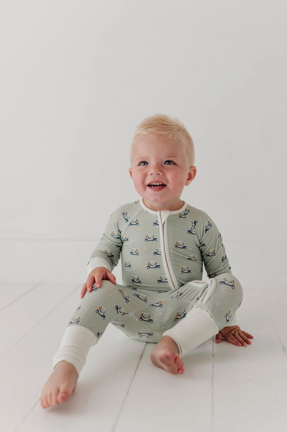 GOLF CART LONG SLEEVE ZIP ROMPER