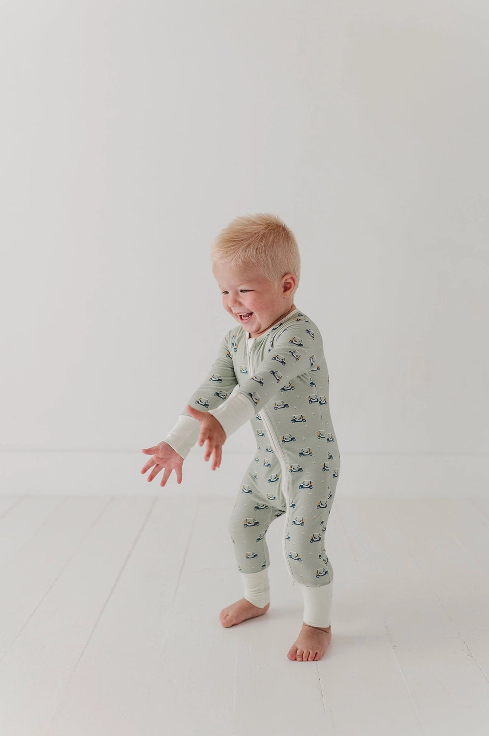 GOLF CART LONG SLEEVE ZIP ROMPER